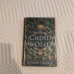 The Gilded Wolves by Roshani Chokshi - Decorative Green & Gold Hardcover